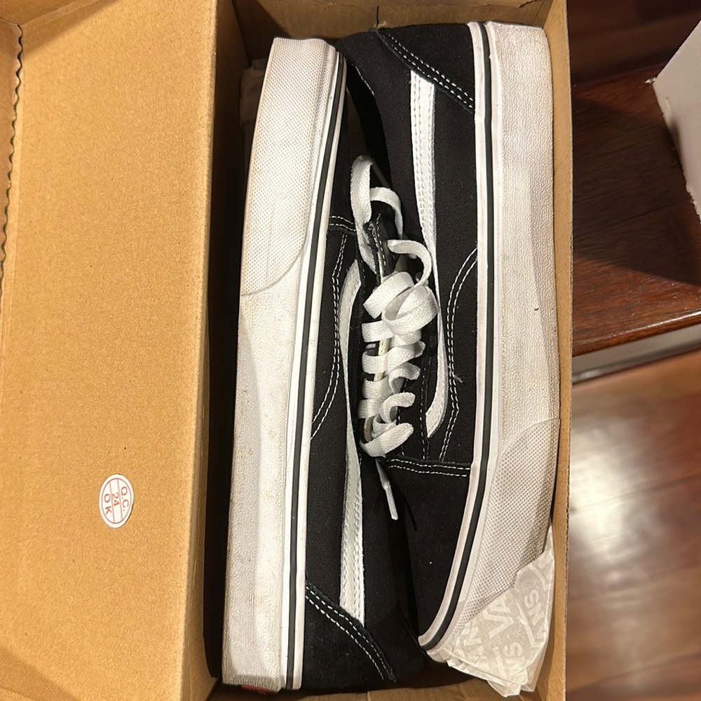 Black vans men’s size 8.5 , lightly worn